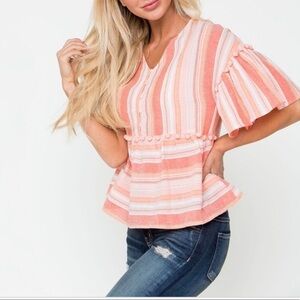 Downeast Emberely Peplum Top with Pom Pom’s